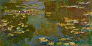 'The Water-lily Pond (Le Bassin Aux Nympheas)’ by Claude Monet. An impressionist painting of a pond with lilypads and water-lillies floating on its surface, and reflections of surrounding foliage.